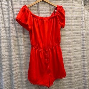 Bright orange shorts jumper